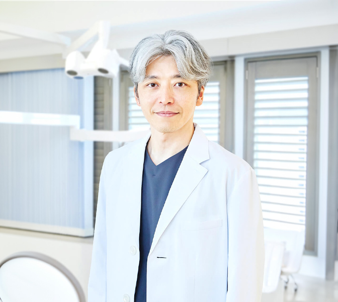 院長・歯学博士 田中 利典