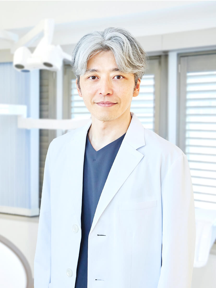院長・歯学博士 田中 利典